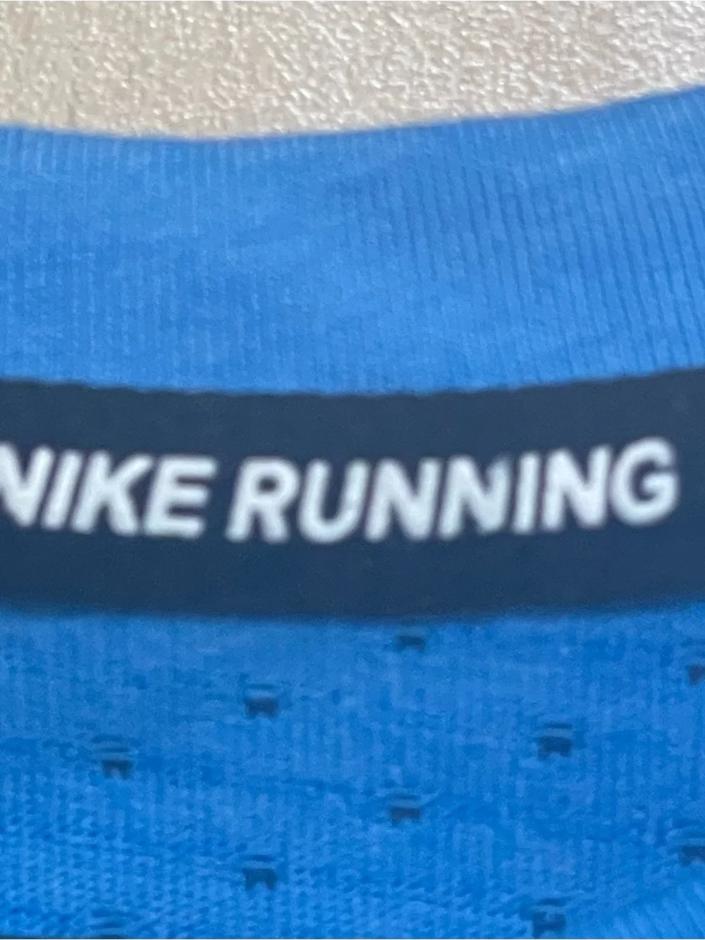 Nike Dri-Fit Women’s Blue Performance V-Neck Tee with White Reflective Accents - Picture 3 of 8